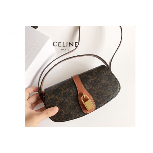 Celine 10I592 CLUTCH ON STRAP IN TRIOMPHE CANVAS AND Tan CALFSKIN Celine 10I592 CLUTCH ON STRAP IN TRIOMPHE CANVAS AND Tan CALFSKIN
