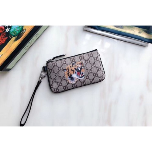Gucci Tiger print Supreme pouch