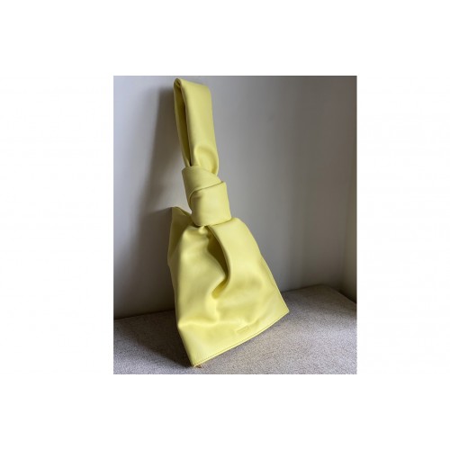 Bottega Veneta Twist Soft clutch with knotted handle in Sherbert Nappa leather