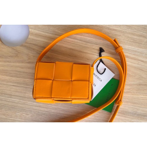 Bottega Veneta Cassette mini bag in Orange Intreccio leather Bottega Veneta Cassette mini bag in Orange Intreccio leather