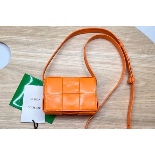 Bottega Veneta Cassette mini bag in Orange Intreccio leather Bottega Veneta Cassette mini bag in Orange Intreccio leather