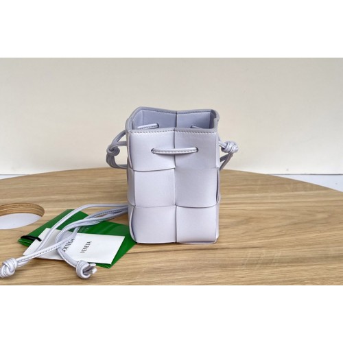 Bottega Veneta Cassette Mini intreccio leather cross-body bucket bag in Purple Leather