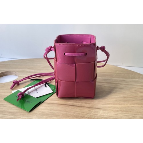 Bottega Veneta Cassette Mini intreccio leather cross-body bucket bag in Azalea Leather Bottega Veneta Cassette Mini intreccio leather cross-body bucket bag in Azalea Leather