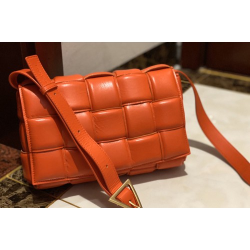 Bottega Veneta padded cassette bag in Orange Lambskin Leather