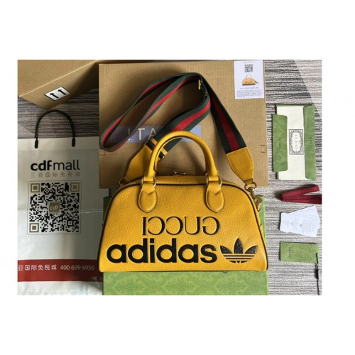 adidas x Gucci mini duffle bag in Orange and Black leather adidas x Gucci mini duffle bag in Orange and Black leather