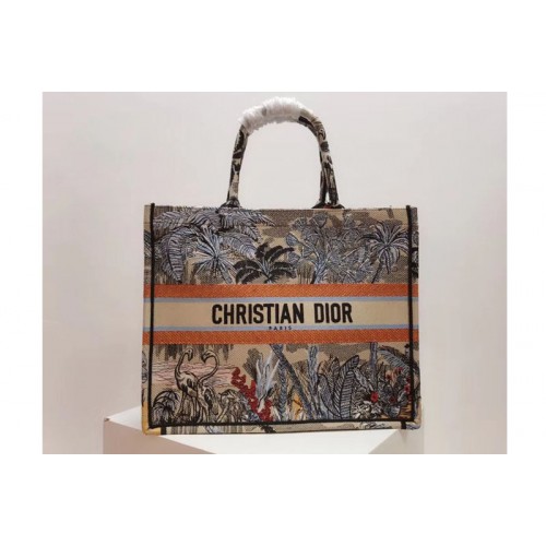 Dior M1286 Book Tote 42mm bag in embroidered canvas With a denim blue Toile de Jouy Tropicalia motif