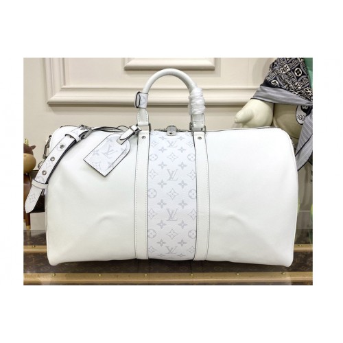 Louis Vuitton M30885 Keepall 50 Bandoulière bag in Monogram coated canvas and Taiga cowhide leather