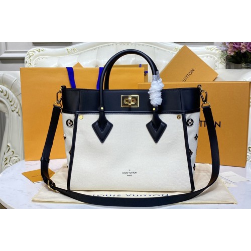Louis Vuitton M59842 On My Side MM tote bag in Canvas and White smooth cowhide leather