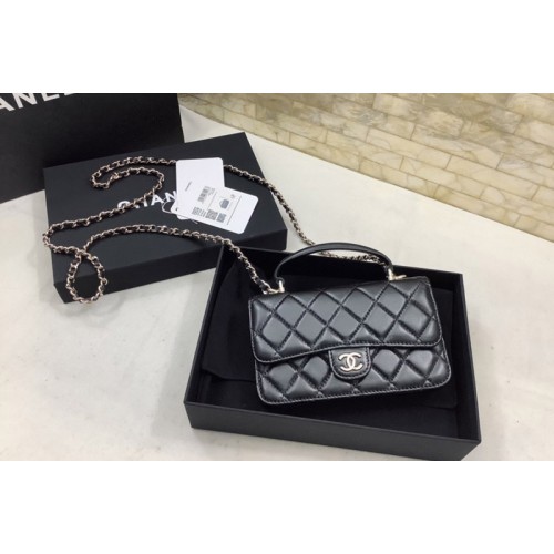 Chanel Mini Flap Bag with Top Handle in Black Lambskin Chanel Mini Flap Bag with Top Handle in Black Lambskin