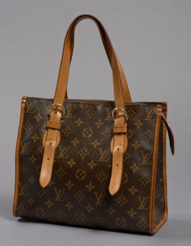 Louis VUITTON, Popincourt haut en toile monogram et cuir naturel. Petite patine d'usage mais très bon état. 23,5 x 27 x 13 cm.