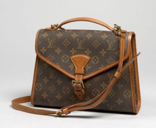 Louis VUITTON, Bel Air en toile Monogram, anse bandoulière amovible et garniture en cuir naturel. 21.5 x 28.5 cm. Petite patine d'usage mais très bel état.