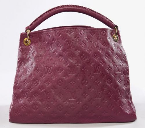 Louis VUITTON, Grand cabas en cuir grainé monogram frambroise, surpiqué dans la couleur, courte anse en cuir ornée d'une tresse, garnitures en métal doré, intérieur en toile à la couleur rayée noire, sept poches plaquées dont une zippée. 33 x 48 x 15 cm. 