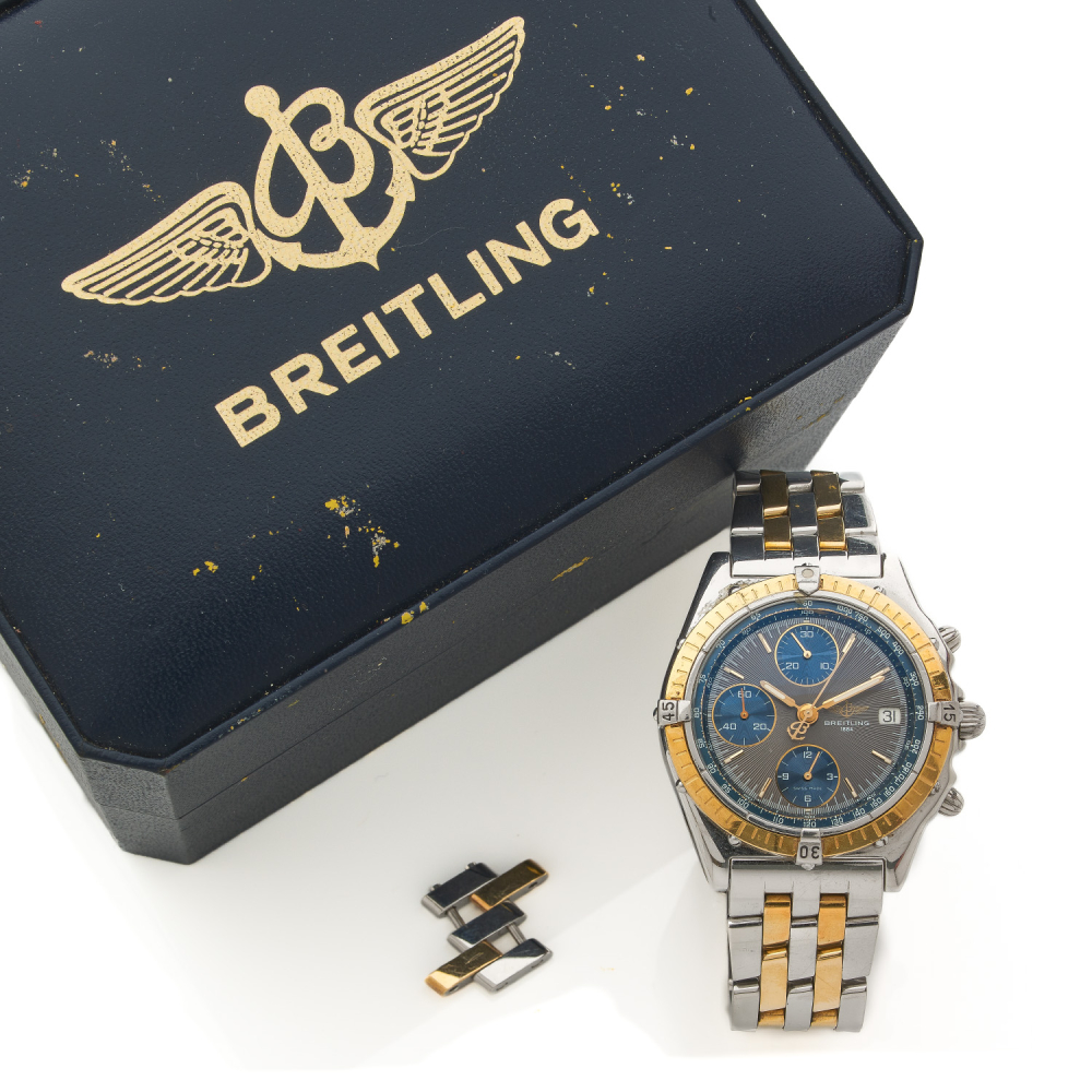 BREITLING
     BREITLING Chronomat, ref. D13048, n° 119333 Vers 1980  Chronographe bracelet en acier et or jaune...