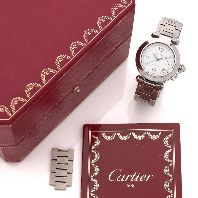 CARTIER,Pasha, ref. 2324, n° CC437379,Vers 2000,Montre bracelet en acier,Boîtier: rond, protection de couronne, signé,Cadran: blanc, chiffres arabes et index bâton appliqués, trotteuse centrale, date à guichet, signé,Mouvement: automatique, signé,Bracelet