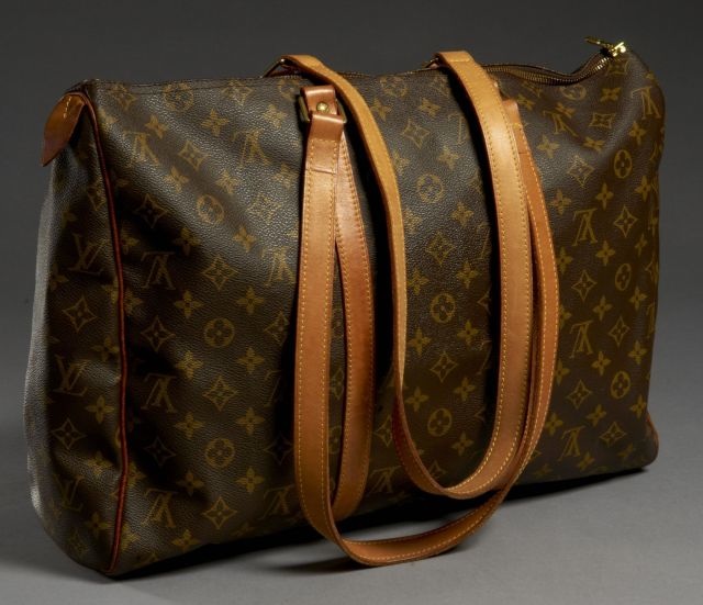 Louis VUITTON Sac Flânerie en toile monogram avec longues anses en cuir de veau. Belle patine sur le cuir, excellent état.