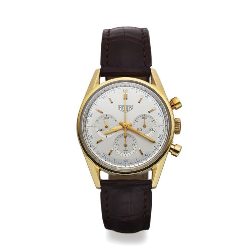 HEUER REF. CS3140. YELLOW GOLD RE-EDITION CHRONOGRAPH. Heuer Chronograph, "Carrera, 1964 re-edition" movement. No. 4520072, No. 1259, Ref. CS3140. Made in a numbered. series circa 1996.. Fine, water resistant, 18K yellow gold wristwatch with. round button