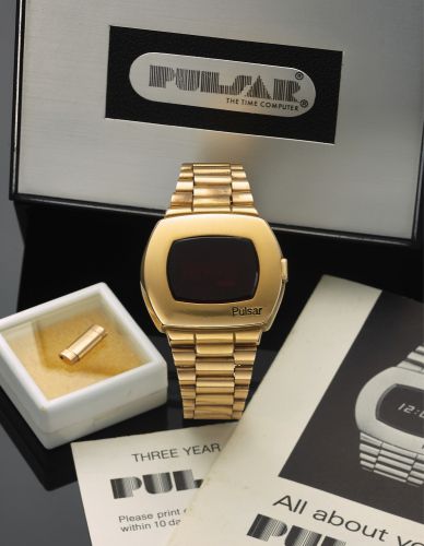 PULSAR DIGITAL TIME. COMPUTER YELLOW GOLD. Pulsar "Digital Time Computer" case No. 17903. Made. circa 1972.. Fine water-resistant, cushion-shaped, 14K yellow gold. LED digital quartz wristwatch with a 14K yellow gold link. bracelet with deployant clasp. A