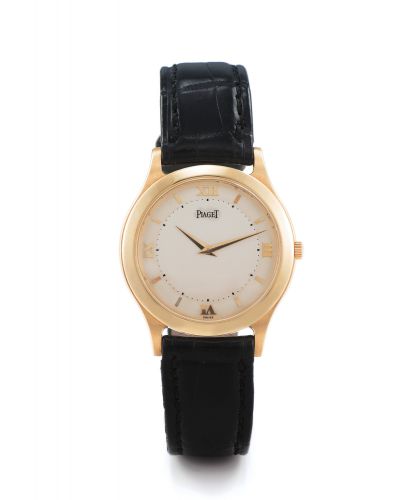 PIAGET REF. 91000 CITEA GEORGES PIAGET YELLOW GOLD. Piaget", No. 9114127, case No. 581582, Ref. 91000. Produced in a limited. edition of 200 examples in the 1990's.. Fine and rare, elegant, manual-winding, 18K yellow gold wristwatch with an 18K yellow gol