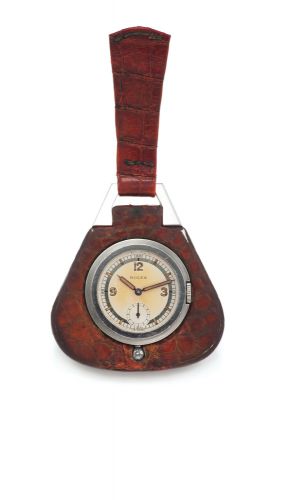 ROLEX REF. 2728 STEEL AND GOLD. Rolex Ref. 2728. Case No. 25059. Made in 1929.. Fine and rare, manual-winding, steel and gold key watch, inserted in a. triangular natural brown leather pendant-case.