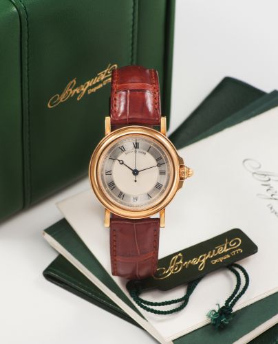 BREGUET MARINE AUTOMATIC YELLOW GOLD. Breguet, "Horloger de La Marine", case No. 2508F, Ref. 3400BA. Sold on November 2nd, 1996.. Very fine, center-seconds, self-winding, water-resistant, 18K. yellow gold wristwatch with date and an 18K yellow gold. Bregu