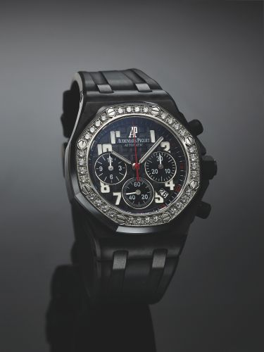 AUDEMARS PIGUET REF 26267 CARBON. DIAMONDS. Audemars Piguet, Genève, "Royal Oak Offshore," No. 0263, case No. G 75785, Ref. 26267FS. Sold on December 12, 2011.. Very Fine, tonneau-shaped, octagonal bezel with diamonds, self-winding, forged carbon chronogr