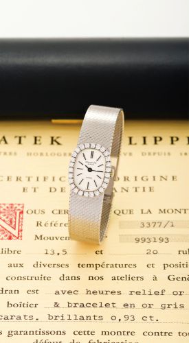 PATEK PHILIPPE REF 3377/1.GOBBI WHITE GOLD AND.DIAMONDS.Patek Philippe, Genève, movement No.993193, Ref. 3377/1.sold on December 1968..Very fine and rare, elegant, oval, 18K white gold and.diamond lady's wristwatch with an integral textured 18K.white gold