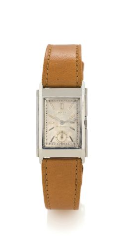 ROLEX, REF 2417, PRINCE ELEGANT.Rolex, Prince Elegant, retailed by Bucherer, case No. 035989, Ref. 2417. Made in the 1940's..Very fine and rare, rectangular curved, stainless steel wristwatch C. Two-body, solid, polished and brushed, snap-on back.