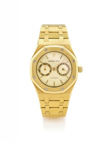 AUDEMARS PIGUET ROYAL OAK DAY-DATE.Audemars Piguet, Genève, Royal Oak, Day/ Date, Automatic, No. 267, Ref. 25572BC. Made circa.1986..Fine, octagonal, self-winding, water-resistant, 18k yellow gold wristwatch with day and date.and an integrated, 18k yellow