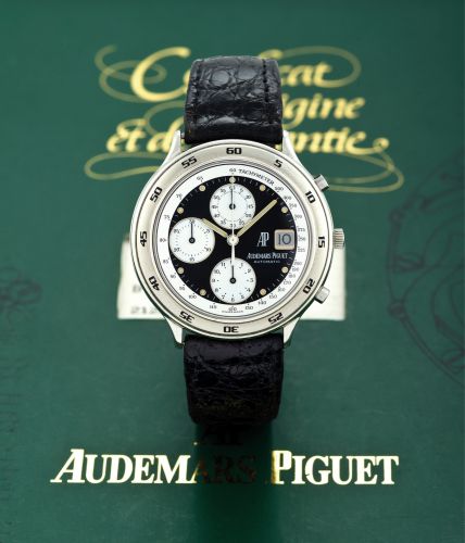 AUDEMARS PIGUET HUITIEME STEEL.Audemars Piguet, Automatic, movement No. 407800, case No. D 42600. Made in the.1990's..Very fine, self-winding, water-resistant, stainless steel wristwatch with round button.chronograph, registers, tachometer, date and a ste