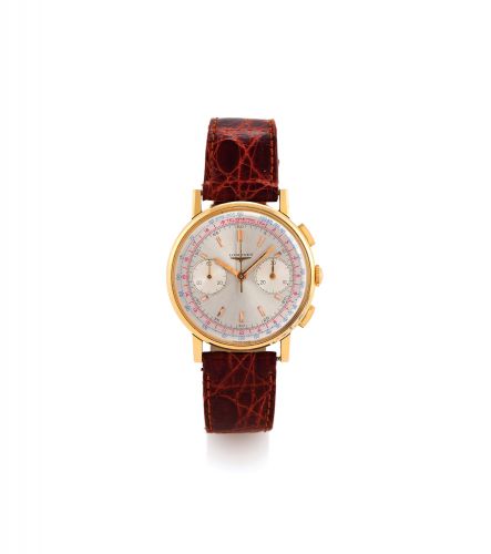 LONGINES CAL. 30CH YELLOW GOLD.Longines, movement No.0116040, Ref. 7414. Made in the 1950's..Fine, 18K yellow gold wristwatch with square button Retour en Vol.chronograph, register, tachometer and telemeter.