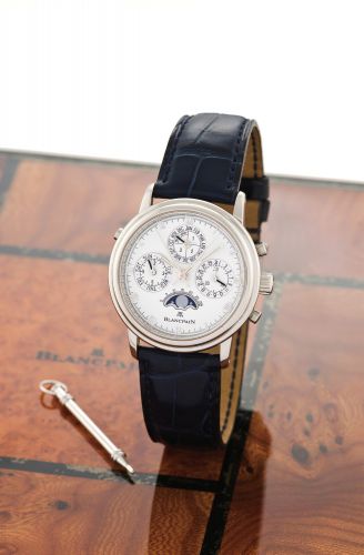 BLANCPAIN SPLIT-SECONDS CHRONOGRAPH.PERPETUAL CALENDAR, PLATINUM.Blancpain, Split-seconds Chronograph, Perpetual Calendar,.No. 40, Ref. 5581-3427. Made in the 1990's..Very fine, astronomic, platinum wristwatch with round.button split-seconds chronograph, 