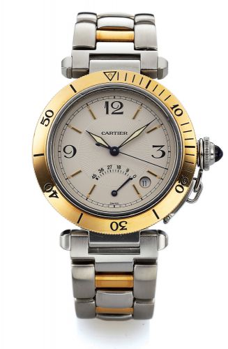 CARTIER REF. 1033 PASHA STEEL GOLD.Cartier, Pasha Power Reserve, No. CC412874, Ref. 1033. Made in the 1990s..Fine, center seconds, self-winding, water resistant to 330 ft/100 m, stainless steel.and 18K yellow gold wristwatch with 45 hour power reserve i