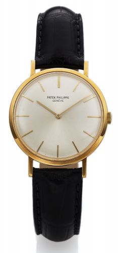 PATEK PHILIPPE REF. 3537 YELLOW GOLD.Patek Philippe, Genève, No. 1156123, case No. 2696841.Ref. 3537. Made in 1970..Fine and rare, elegant, 18K yellow gold wristwatch with an.18K yellow gold Patek Philippe buckle.