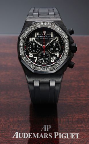 AUDEMARS PIGUET REF 26267 FORGED CARBON.DIAMONDS.Audemars Piguet, Genève, Royal Oak Offshore, No. 0263.case No. G 75785, Ref. 26267FS. Sold on December 12.2011..Very Fine, tonneau-shaped, octagonal bezel with.diamonds, self-winding, forged carbon, chronog
