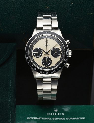 ROLEX REF. 6264 PAUL NEWMAN STEEL.Rolex, Cosmograph, Daytona, case No. 2425681, Ref. 6264..Made circa 1968..Very fine and very rare, water-resistant, stainless steel.wristwatch with anti-reflective black tachometer bezel.round button chronograph, register