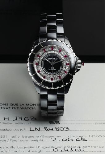 CHANEL REF. L.N. 84803, WHITE GOLD, BLACK CERAMIC.DIAMOND RUBY.Chanel, Paris, J12 Automatic, Ref. L.N. 84803. Made circa 2005..Very fine, tonneau-shaped, curved, center seconds, self-winding, water resistant to 100 m, 18K white gold, ceramic.diamonds an