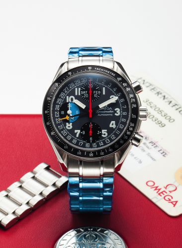 OMEGA SPEEDMASTER AUTOMATIC TRIPLE DATE STEEL.Omega, Speedmaster, Automatic, case No. 55340399, Ref. 3520.53..Sold on December 10th, 1996..Fine, asymmetric, self-winding, water-resistant, stainless steel.wristwatch with round button chronograph, registers