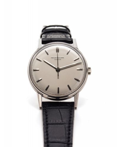 PATEK PHILIPPE REF. 3411 WHITE GOLD.Patek Philippe, Genève, No. 711080, case No. 2633943.Ref. 3411. Made in 1963, sold on Decmber 10th, 1963..Very fine and rare, center seconds, 18K white gold.wristwatch with stainless steel Patek Philippe buckle..Accompa