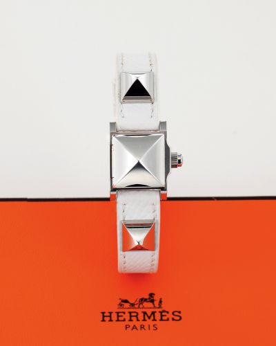HERMES REF. ME2.110 MEDOR STEEL.Hermès, Paris, Medor, case No. 2593730, Ref. ME2.110. Made circa 2000..Fine, collar motif, stainless steel lady's quartz wristwatch with concealed dial.stainless steel Hermès buckle. Accompanied by a fitted box.