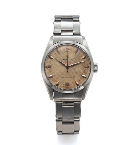 ROLEX, REF. 6444 RED DEPTH STEEL.Rolex, Oyster, Shock-Resisting, case No. 115900.Ref. 6444. Made circa 1954..Fine, tonneau-shaped, center seconds, water-resistant.stainless steel wristwatch with a stainless steel riveted.Rolex bracelet.