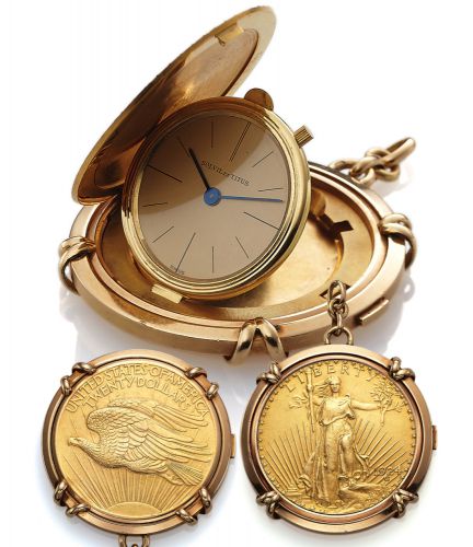 SOLVIL ET TITUS TWENTY DOLLAR.GOLD COIN PENDANT WATCH.SOLVIL et TITUS, Swiss, Twenty Dollars Coin.Pendant watch dated 1924. Made in the 1950s..Very fine, 18K yellow gold $20 U.S. coin dated.1904 with concealed watch.
