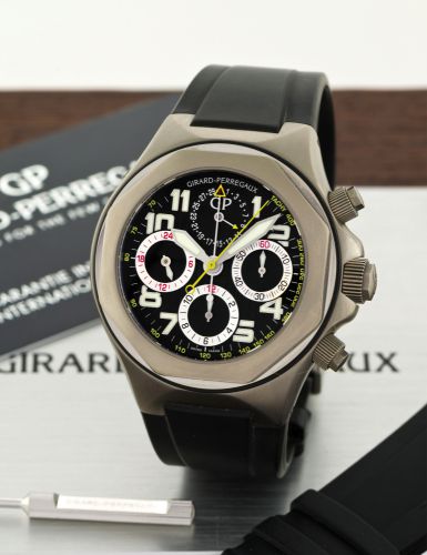 GIRARD-PERREGAUX LAUREATO EVO 3 CHRONOGRAPH TITANIUM.Girard-Perregaux, Laureato Evo 3, No. 752, Ref. 80180. Sold on December 18th, 2009..Fine, self-winding, water-resistant, stainless steel wristwatch with round button.chronograph, registers, tachometer, 