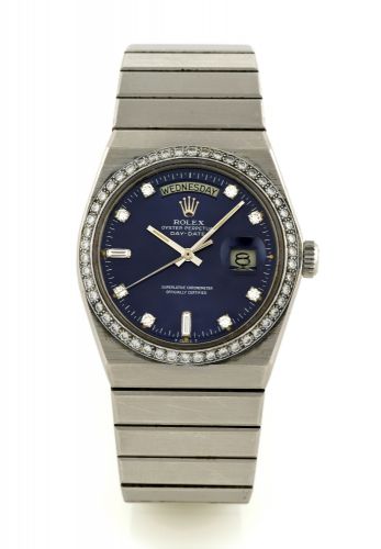 ROLEX ROLEX REF 1831/1850.PLATINUM DAY DATE NO. 001/8.Rolex, Oyster Perpetual, Day-Date, Superlative.Chronometer Officially Certified, No. 001, case No..5055759, Rolex Ref 1831/1850. Made in 1977..Very fine and very rare, tonneau-shaped, center seconds.se