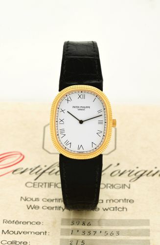 PATEK PHILIPPE REF. 3986 GOLDEN ELLIPSE YELLOW GOLD.Patek Philippe, Genève, Golden Ellipse, No. 1337563, Ref. 3986. Made in May 1989..Fine, oval, 18K yellow gold wristwatch with an 18K yellow gold buckle. Accompanied.by the Certificate of Origin.