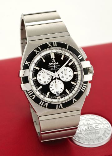 DOUBLE EAGLE CO-AXIAL CHRONOGRAPH.Omega, Constellation Double Eagle, Co-Axial, Chronometer, case No. 78318428.Ref. 15145100. Made circa 2006..Fine, tonneau-shaped, self-winding, water-resistant, stainless steel wristwatch with square.button chronograph, r