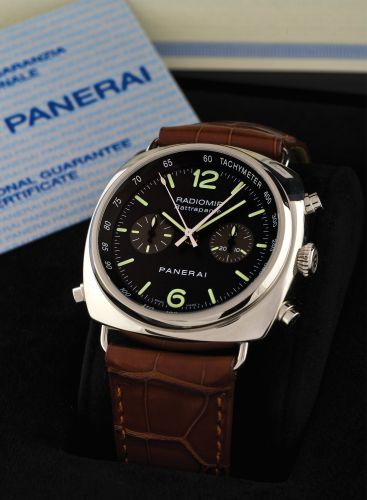PANERAI RADIOMIR RATTRAPANTE, PAM 214.Officine Panerai, Radiomir Rattrapante, Automatic Chronometer.No. H 0875/1000, Ref. PAM 214/OP 6642. Made in a limited edition.of 1000 pieces in 2005, sold in January 2007..Very fine, large, cushion-shaped, self-windi