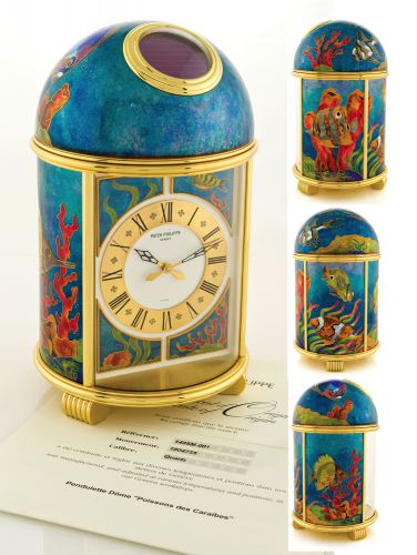 PATEK PHILIPPE, REF. 1489.POISSONS DES CARAIBES PENDULETTE DOME.Patek Philippe, Genève, Pièce Unique - Pendulette Dôme Poissons.des Caraibes movement No. 1804755, case No. 22074, Ref. 1489M.the cloisonné enamel panels signed CC. Made in 2004, sold on.June