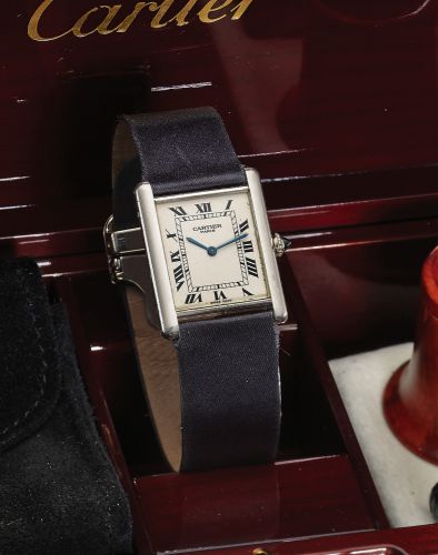 CARTIER REF. 1601 PLATINUM TANK MECANIQUE.Cartier, Paris, Tank, No. 0030 CC, Ref. 1601. Made in the 1980s..Very fine and elegant, rectangular, thin, platinum wristwatch with an 18K white gold Cartier.deployant clasp. Accompanied by the original wooden box