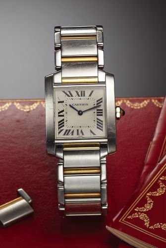 CARTIER REF. 2301 TANK STEEL GOLD QUARTZ.Cartier, Tank Française, case No. CC 180592.Ref. 2301. Made circa 2000..Fine, square and curved, water-resistant, stainless steel.and yellow gold quartz wristwatch with a stainless steel.and yellow gold Cartier l