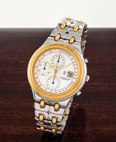 AUDEMARS PIGUET HUITIEME CHRONOGRAPHE.Audemars Piguet, Genève, Chronograph Automatic, case No. C 38184..Made in the 1990s..Very fine, self-winding, water-resistant, stainless steel and 18K.yellow gold wristwatch with round button chronograph, registers.ta